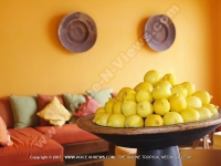 general_view_of_the_living_room_and_a_bunch_of_lemons_at_la_palmeraie_hotel.JPG