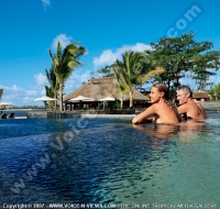 anahita_resort_mauritius_couple_having_romantic_time_in_swimming_pool_watermark_vew.jpg