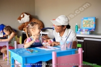 anahita_resort_mauritius_kid_playing_with_lady_in_miniclub_watermark_view.jpg