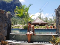 les_pavillons_hotel_mauritius_lady_relaxing_near_the_pool.jpg