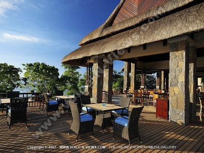 the grand mauritian a luxury collection resort and spa mauritius season restaurant terrace view

