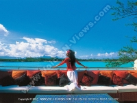 ile_des_deux_cocos_villa_mauritius_lady_on_balcony_and_sea_view.jpg