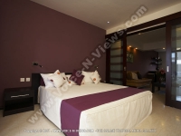 grand_bay_suites_mauritius_luxurious_bedroom_and_living_room.jpg
