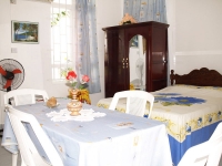 les_bougainvillers_apartments_mauritius_dining_room_and_bedroom_view.jpg