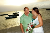 just_married_couple_on_the_beach_with_sunset_view_mauritius.jpg