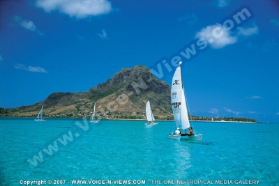 paradis hotel & golf club mauritius hobie cat and mountain view
