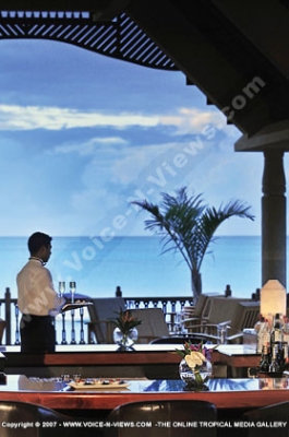 royal palm hotel mauritius waiter at the bar
