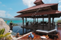 sainte_anne_resort_seychelles_lady-erlaxing_in_villa_royale_swimming_pool.jpg