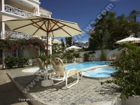 standard_apartment_mont_choisy_mauritius_ref_114_pool_area_sun_beds.jpg