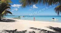 trou_aux_biches_hotel_mauritius_lady_walking_on_the_beach.jpg
