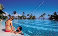 dinarobin_hotel_mauritius_couple_and_swimming_pool_view.jpg