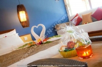 laguna_beach_hotel_and_spa_mauritius_bedroom_with_honeymoon_set_up.jpg