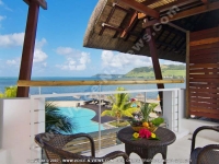 laguna_beach_hotel_and_spa_mauritius_room_balcony_with_swimming_pool_and_sea_view.jpg