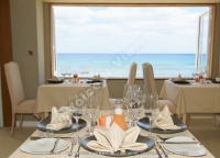 le_recif_hotel_mauritius_restaurant_interior_and_sea_view.jpg