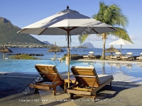 Pool_side_with_its_l0ng_chairs_sands_resort_and_spa.jpg