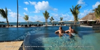 anahita_resort_mauritius_couple_in_swimming_pool_general_watermark_view.jpg