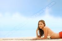 anahita_resort_mauritius_lady_posing_on_the_sand_watermark_view.jpg
