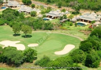 tamarina_golf_spa_and_beach_club_mauritius_green_and_villas_aerial_view.jpg
