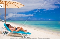 pearle_beach_hotel_mauritius_couple_relaxing_in_sunbed.jpg