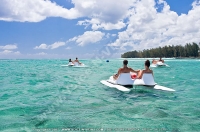 pearle_beach_hotel_mauritius_guests_in_paddle_boats.jpg