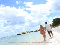 young_couple_walking_on_the_beach_of_the_intercontinental_resort_mauritius.jpg