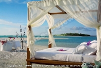 kanuhura_resort_maldives_bed_on_beach.jpg