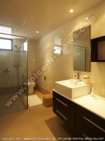 grand_bay_suites_spacious_bathroom_with_shower_and_toilet.jpg