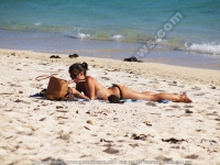 woman_bikini_lying_beach_le_morne_mauritius.jpg