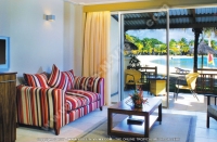 shandrani_resort_and_spa_hotel_mauritius_superior_room_terrace_and_living_room_view.jpg