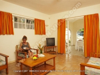 standard_apartment_mont_choisy_mauritius_ref_113_lady_relaxing.jpg
